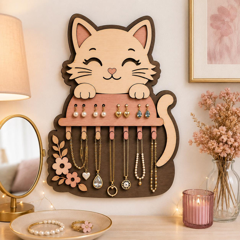 Cat-shaped jewelry holder laser cut design displayed in a cozy vanity area with earrings, necklaces, floral accents, and stylish wall-mounted organization for accessories.