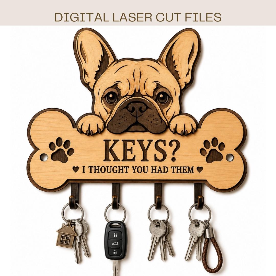 French Bulldog key holder SVG laser cut file featuring a layered wooden dog design with four key hooks and a funny “Keys? I Thought You Had Them” sign.