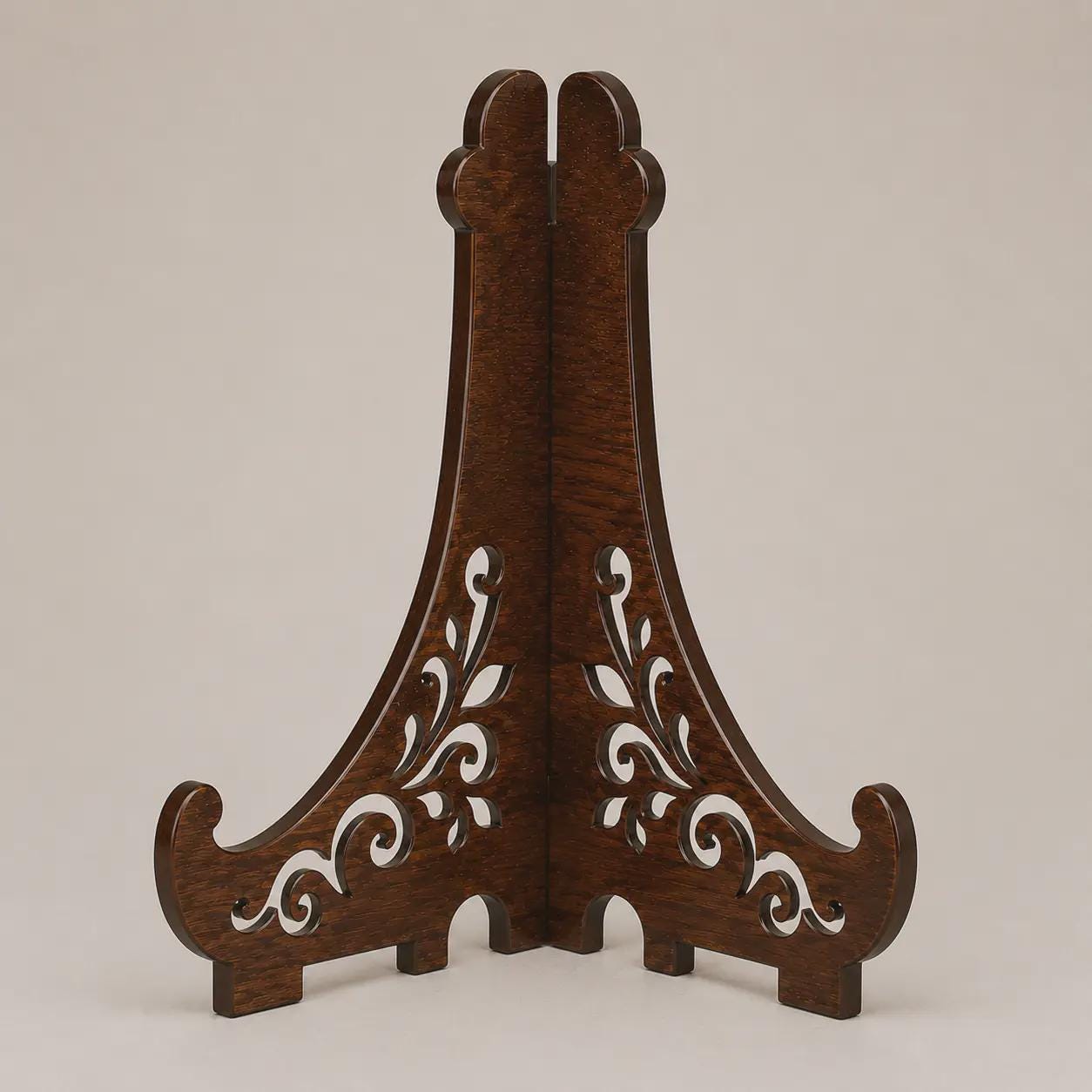 Assembled wooden easel stand SVG shown from an angled perspective, featuring ornamental cutout details and sturdy display support for plates, frames, and artwork.