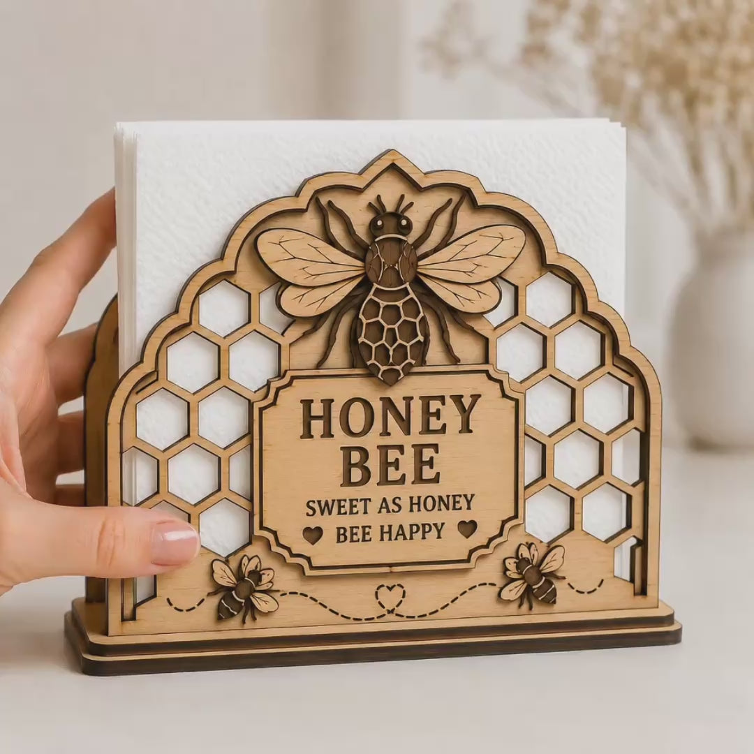 Watch this Honey Bee Napkin Holder SVG laser cut file come to life with its layered honeycomb design, decorative bees, and farmhouse-inspired details. Perfect for Glowforge, xTool, Cricut, and laser cutting enthusiasts creating unique kitchen decor, handmade gifts, and woodworking projects. Designed for easy assembly and optimized for 3mm wood, this decorative napkin stand adds a charming rustic touch to any home.